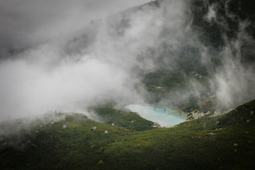 A view of Vysne Furkotske pleso (partly hidden in clouds) in Furkotska dolina, Vysoke Tatry (High Tatras), Slovakia
