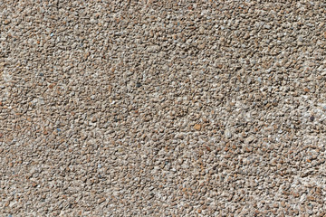 Pebble texture background. Many small stones backdrop.