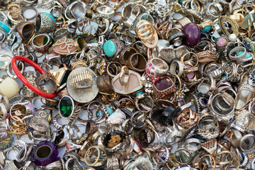 Lot of vintage rings and jewelry. Texture background.