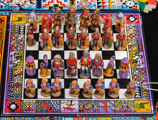 Fototapeta premium The traditional chess game, handicraft market in Cusco, Peru
