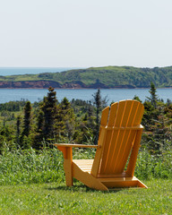 Yellow chair near Salicorne Hostel, Magdalen Islands