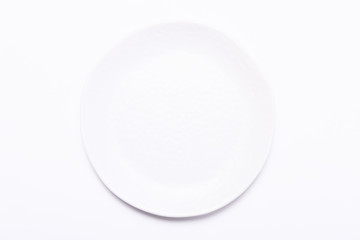 Ceramic plate on a white background. Top view