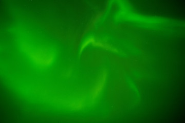 Obraz na płótnie Canvas Yellowknife,Canada-August 30, 2019: The polestar, Cassiopeia and aurora borealis observed in Yellowknife 