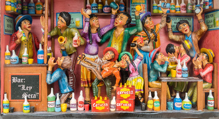 Naklejka premium Colorful representation of statuettes of people, in Cusco, Peru