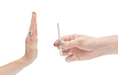 Hand is refusing cigarette offer. Stop smoking concept.