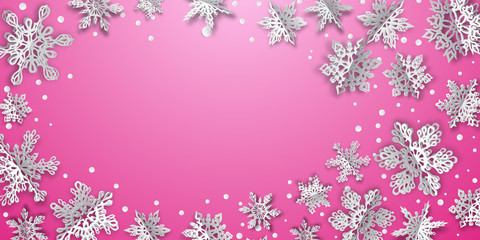 Christmas background with volume paper snowflakes with soft shadows on pink background