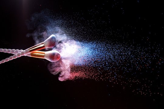 The magic of beauty. Riot of colors. A wave of makeup brushes. Creative moment. Space a makeover. The makeup artist's universe.
