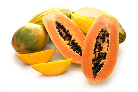 Tropical fruits, papaya, mango and melon isolated on a white background, close-up