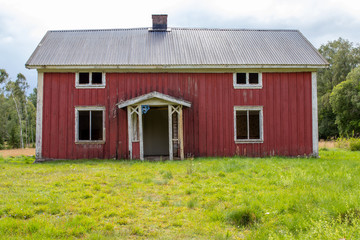 Red deserted house