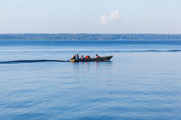Little boat with people