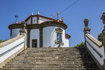 View of Braga Church of Our Lady of Guadalupe (Capella de Guadalupa) - church with a circular shape with image of Our Lady of Guadalupe on front. Church completed in 1725. Braga, Portugal.