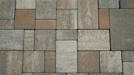 Natural stone wall texture. Rustic colorful surface floor pavement background. Texture tile