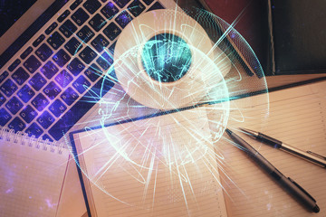 Business theme hologram drawings over computer on the desktop background. Top view. Multi exposure. Concept of international connections.