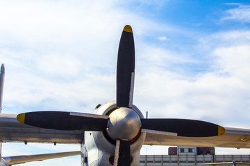Airplane propeller against the blue sky.