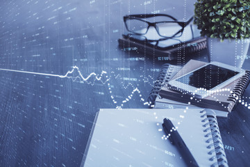 Double exposure of forex chart drawing and cell phone background. Concept of financial trading