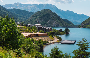 Fototapeta premium Lanuza village and reservoir in Valle de Tena