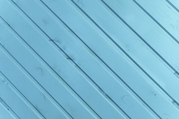 the surface of the wooden slats is painted blue.