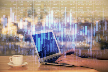 Double exposure of businesswoman hands typing on computer and forex chart hologram drawing. Financial analysis concept.