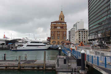 Fototapeta na wymiar Auckland, New Zealand - December 26 2019: the view of ferry terminal and pier in CBD on December 26 2019 Auckland, New Zealand.