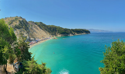 Fototapeta na wymiar Panoramic view at beach on coast of ionic sea at Albania