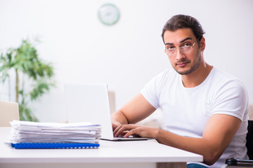 Young disabled man working from house