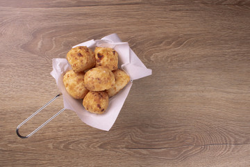 typical Brazilian snack: tapioca dumpling with honey