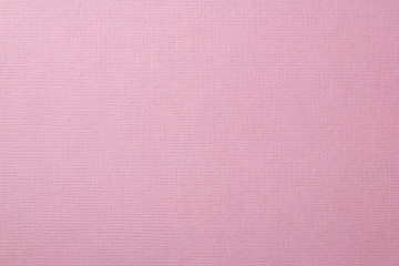 ピンク色の絹目調の質感のある紙の背景テクスチャー
