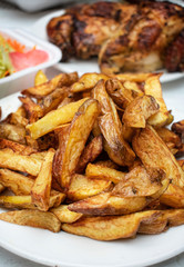 Peruvian grilled chicken, grilled wings, braoster and native potatoes