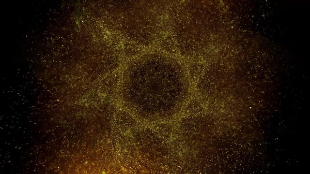 Elegant, detailed, and golden particles flow with shallow depth of field underwater.Gold ink in water shooting with high speed camera. Golden glitter sand or dust creating abstract cloud..