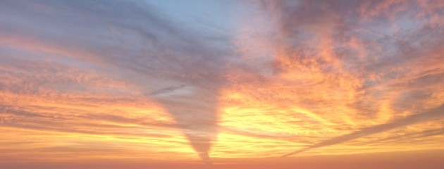 Super Sunset with a tornado shaped cloud