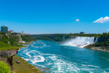 Fototapeta premium Niagara Falls - View of the American Falls and Rainbow International Bridge