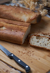 Sliced homemade bread on wooden board