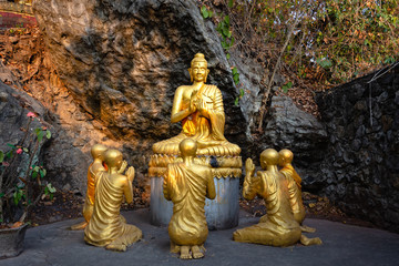 Gold buddha statue at Mount Phousi in Luang Prabang, Laos