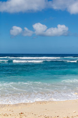 Fototapeta na wymiar Popular Melasti Beach (Pantai Melasti), Bukit, Bali, Indonesia. Turquoise water, rocks, ocean scenery. 