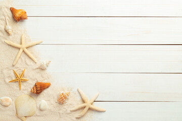 Summer background with beach objects - starfish, seashell on white wood table background top view with copy space. - obrazy, fototapety, plakaty