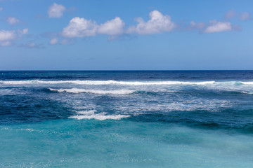 Popular Melasti Beach (Pantai Melasti), Bukit, Bali, Indonesia. Turquoise water, rocks, ocean scenery. 