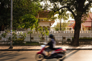 blurred movement of motorbike in Vientiane, Laos