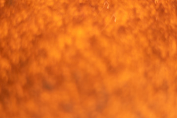Orange bokeh and yellow blur abstract