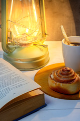 Cup of coffee and cookies in the background