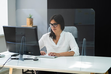 Employee In Office Distancing Using Sneeze Guard