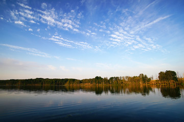 lake and blue sky with clouds in the morning