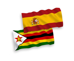 Flags of Zimbabwe and Spain on a white background