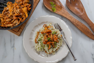 home made Risotto with chanterelle mushrooms and herbs
