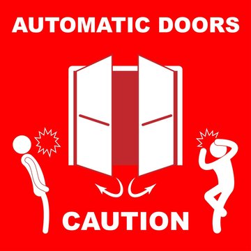 Automatic Doors Sign With The Text Caution