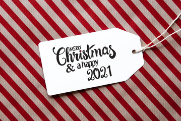 Red Wrapping Paper, Label, Merry Christmas And A Happy 2021