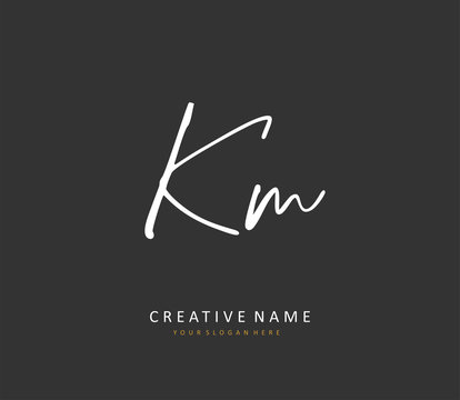 K M KM Initial letter handwriting and signature logo. A concept handwriting initial logo with template element.
