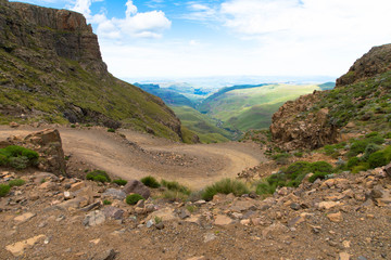 Endless hairpin turns on the dirt road leading towards the Sani Pass on the border of South Africa and Lesotho.