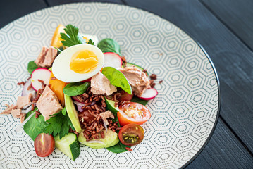 red rice with vegetables and tuna