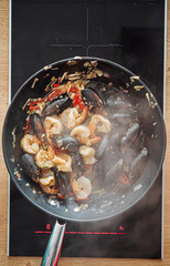 paella with calamari and mussels