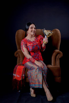 portrait of beautiful indonesian women wearing traditional batak costume